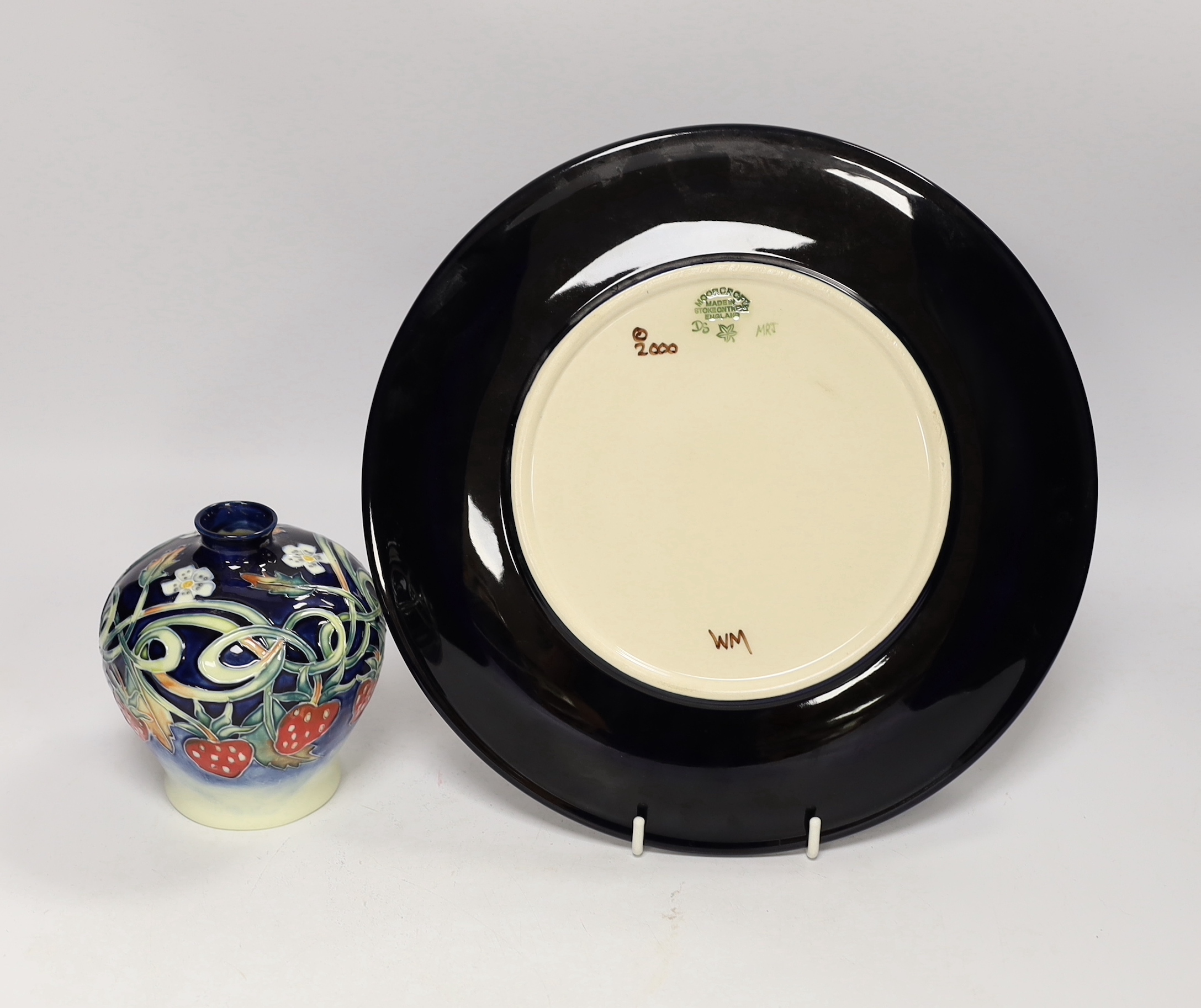 A Moorcroft Sweet Betsy plate and a Jeanne McDougall small vase, plate 26cm diameter